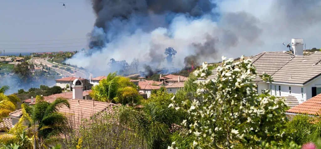 Using Sprinklers to Reduce Minimum Water Supplies for Suburban and Rural Firefighting